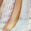A close up of the mesh fabric on a chair