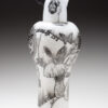 A black and white vase with flowers and butterflies.