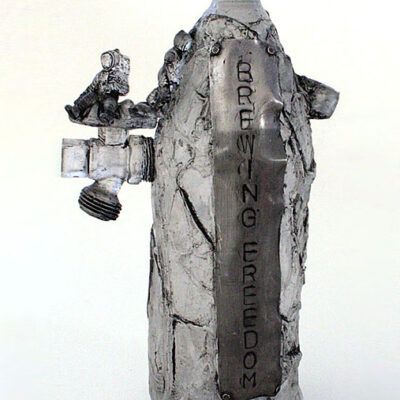 Jason Chakravarty, Brewing Freedom, 2010. Cast Glass, metal.