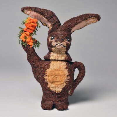 Laura Leonard, Got Carrots, a beadcovered rabbit teapot sculpture.